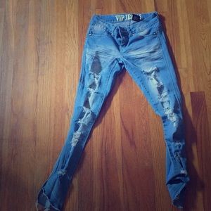 Ripped jeans. They are a light blue jeans.